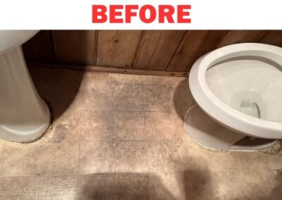 Worn linoleum floor in small rustic bathroom before renovation – Frank Handyman Services Portland