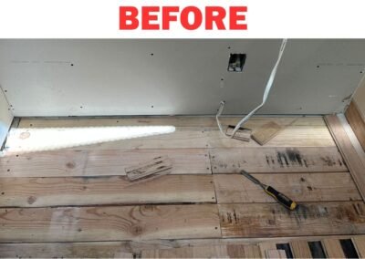 Exposed subfloor before hardwood floor repair in Portland by Frank Handyman Services